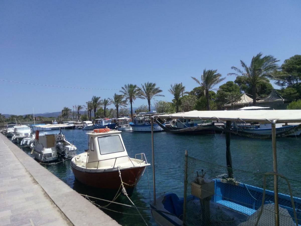 Margherita Holiday House Porto Pino Exterior photo